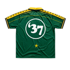 Green DMA'S sports jersey with number 37 and yellow accents.